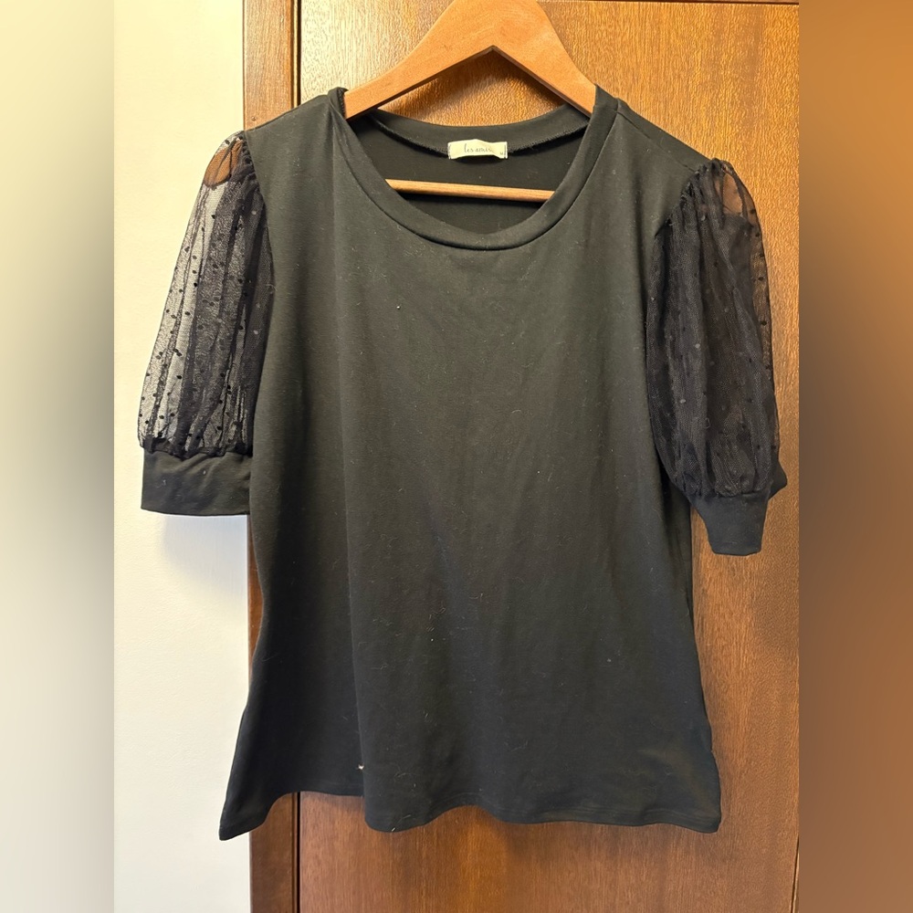 Chic Black Maternity Top with Sheer polka dot Sleeves